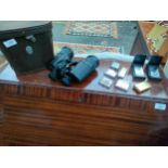 Set of Mark Scheffel 30 x 50 binoculars with leather case together with collection of lighters to