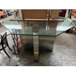 Contemporary mirror base table and octagonal glass top . [Originally used in a designer shop on