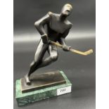 Mario Nick Bronze sculpture of a figure hockey player, green marble base and signed Nick. [21cm