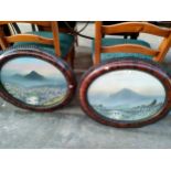 Pair of countryside mountain scene pictures set oval framing