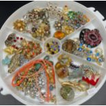 Collection of vintage costume brooches and necklaces.