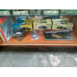 Shelf of boxed corgi trucks , train items etc