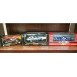 3 Boxed Burago classic models includes e type jaguar , Shelby cobra etc