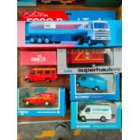 Selection of boxed corgi vans together with esso tanker truck