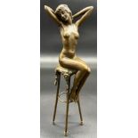 Bronze sculpture of a nude lady sat upon a stool. [27cm high]