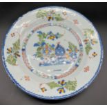 18th century delft hand painted wall charger bowl/ plate. Decorated with foliage/ flowers and ornate