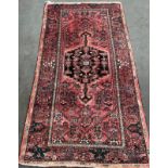 Hand knotted Iranian rug. Red Ground and highly decorative. [250x135cm]