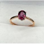 10ct rose gold ladies ring set with a single oval cut pink tanzanite stone. [Ring size R] [2.