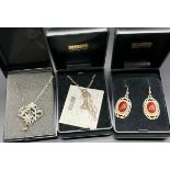 A Pair of Silver and red stone Ortak earrings, Ortak silver flower pendant and silver chain.