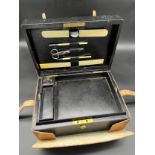 Antique Asprey of London leather travel stationary box with tan leather travel case. Fitted