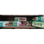 Shelf of Corgi Eddie Stobart trucks etc