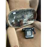 Brass mirror together with telephone
