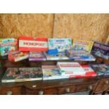 Large lot of monopoly games unchecked