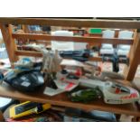 Shelf of vintage toys includes avengers ship etc