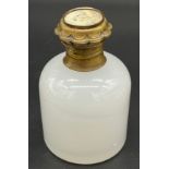 19th century white glass perfume bottle, designed with a gilt metal lid depicting a small picture of