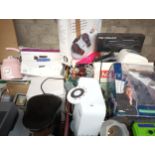 A large selections of electricals to include kettles, straighteners, lamps, hairdryer etc