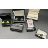 A Lot of cuff links, tie clips and Zippo Lighter. Skull Industria Zippo lighter