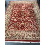 Large Indian wool rug. Ornage/ red ground. [360x275cm]