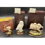 Three boxed Country Artists owl figures. 'Little Owl with Apple Blossom, Snowy Owl & Baby Owlets'