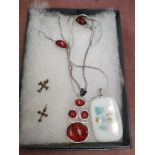 Amber style necklace and earrings set together with 2 silver cross earrings set with garnet stones