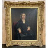 Large 19th century oil on canvas portrait of a seated lady. Fitted within a moulded gilt frame. [