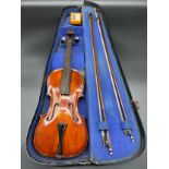 Antique 3/4 violin, two bows and dome top case.
