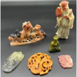 A Lot of Chinese Hardstone, soapstone and jade sculptures. Includes amulets and figures.