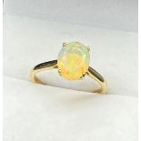 10ct yellow gold & opalescent style cut stone ring. [2.36grams] [Ring size R]