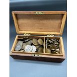 Box containing a large quantity of one pennies and half pennies.