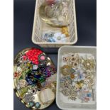 Collection of vintage costume jewellery to include ornate brooches, necklaces and clip on earrings