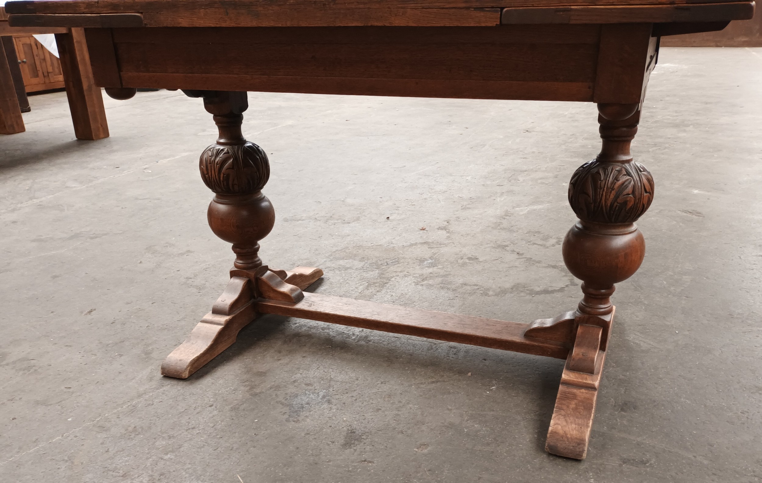 Antique oak extending dining table, the rectangular surface raised by carved acorn design columns - Image 2 of 4