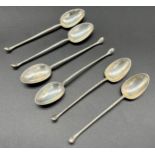 A Set of 6 Sheffield silver golf club shaft tea spoons. Produced by Thomas Bradbury & Sons Lt.