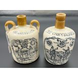 Two Antique Stone ware Flagons advertising 'The Greybeard' Heather Dew Whiskey. Produced by Mitchell