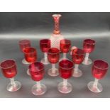 A Collection of 11 Antique cranberry glass and facet cut stem wine glasses, together with