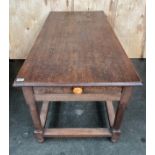 Antique oak kitchen table/prep table, the rectangular surface above a frieze drawer raised on turned