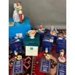 Collection of Disney collectable porcelain figurines. Includes Disney showcase Royal Doulton