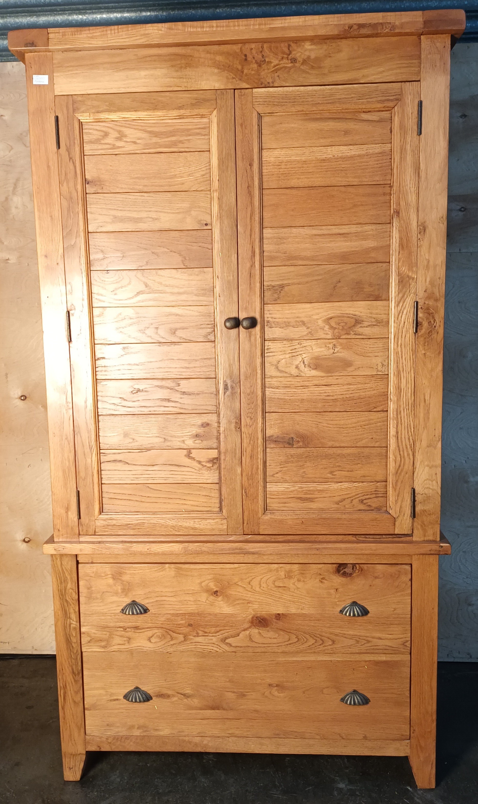 Vancouver Oak double wardrobe, two doors opening to rail and shelves above two drawers [