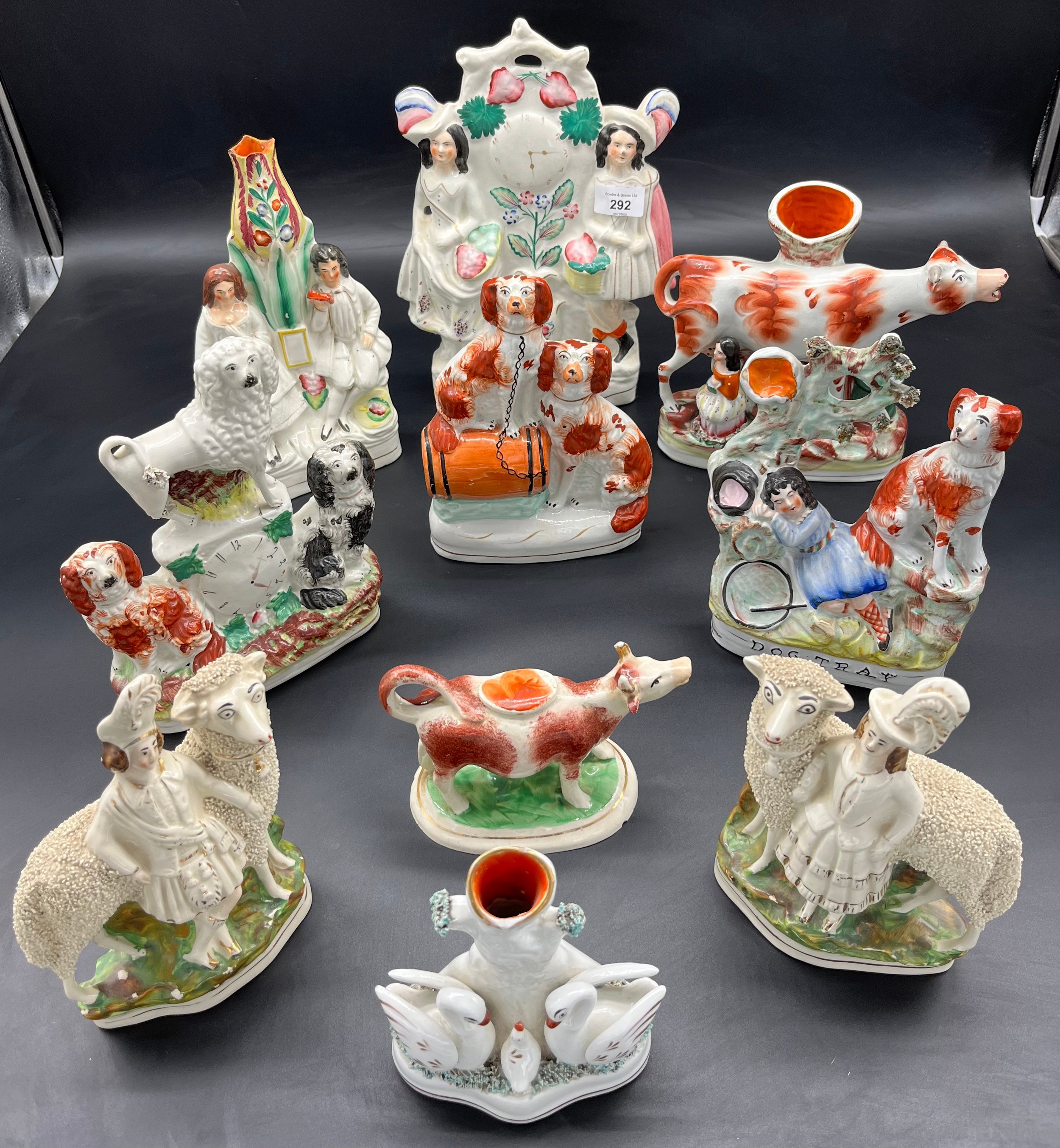 A Collection of 19th century Staffordshire flatback figures. Includes creamer.
