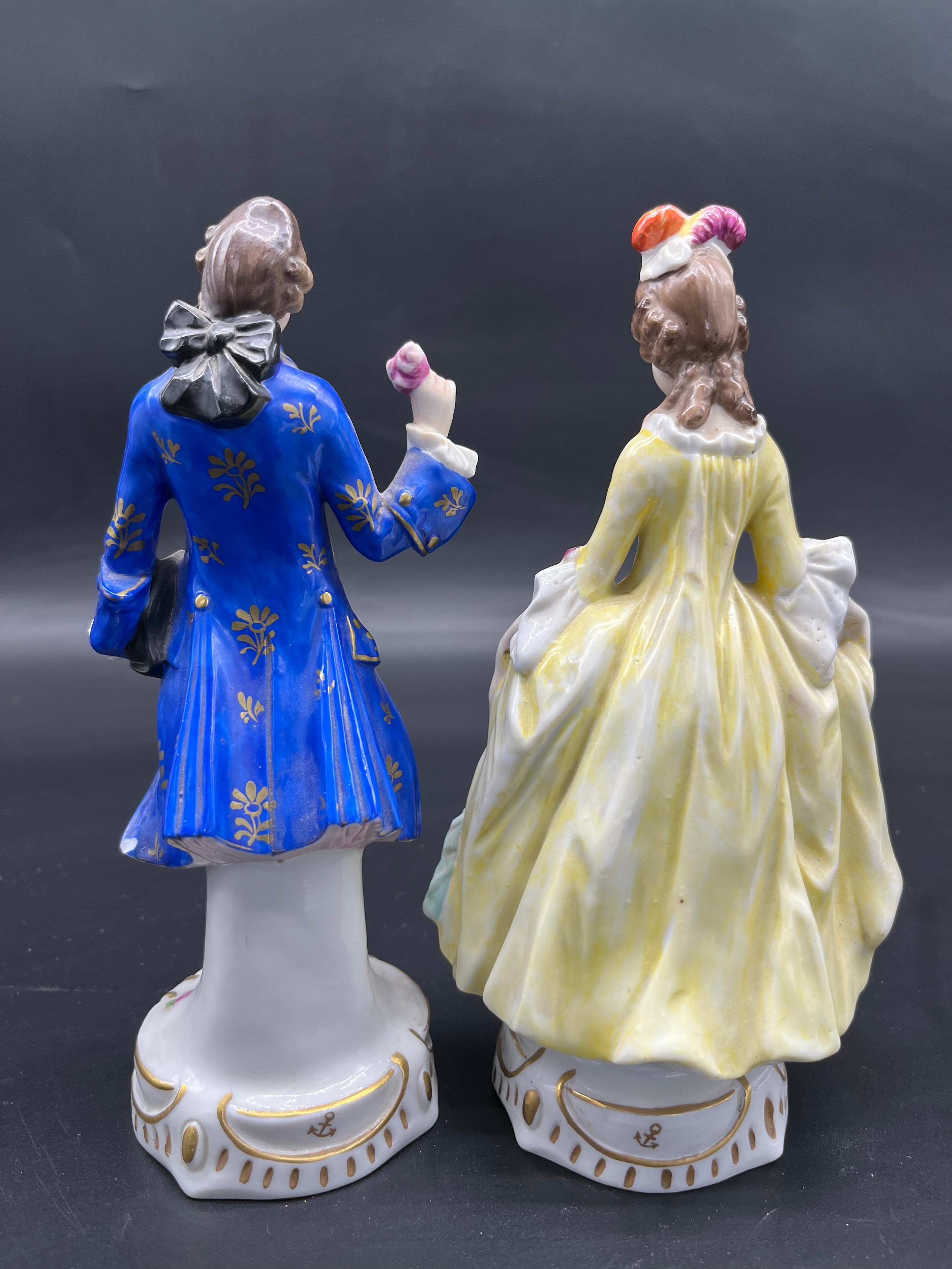 Two 19th century Chelsea pottery gentleman and lady figurine. [19cm high] - Image 2 of 2