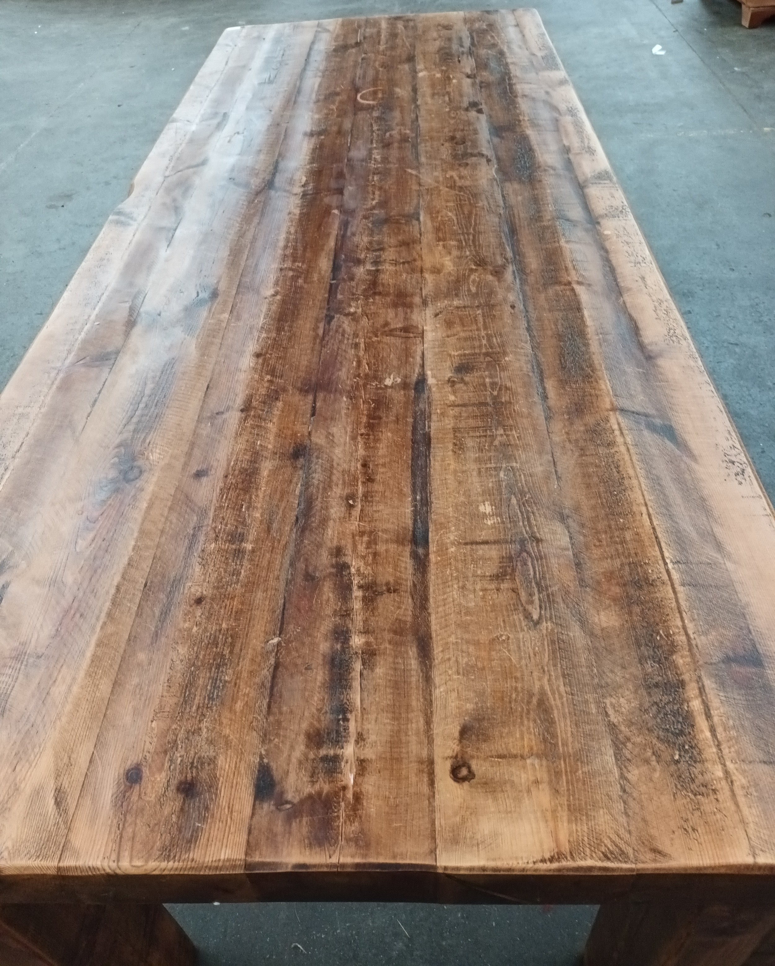 Solid rustic wood dining table, the long rectangular surface raised on square block legs [ - Image 5 of 5
