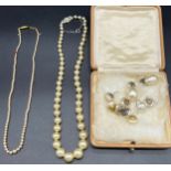 A Vintage pearl necklace designed with a 9ct gold clasp and catch, together with another pearl