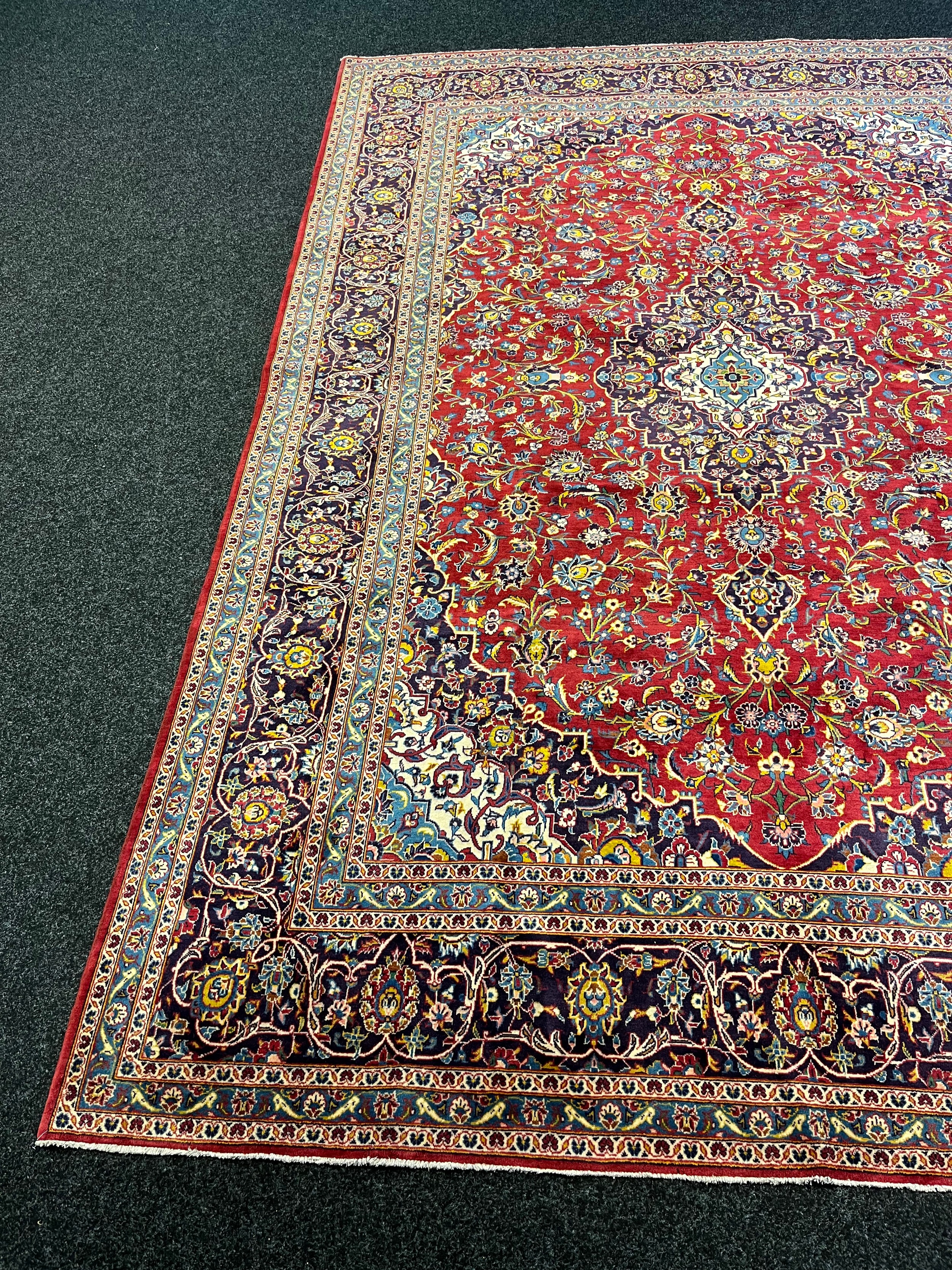 Large Persian carpet/rug, highly decorative with red ground. [535x296cm] - Image 2 of 7