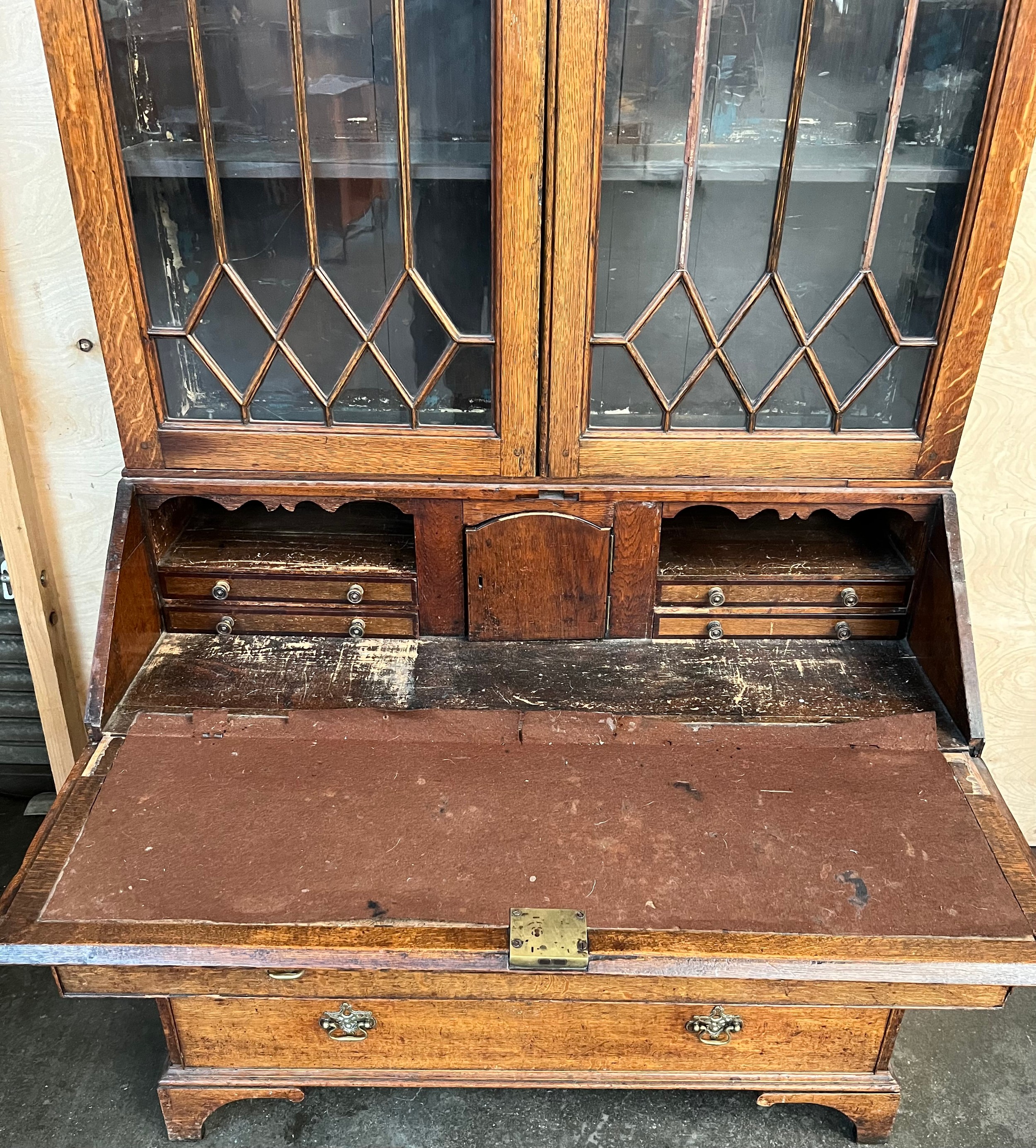 19th century bureau bookcase, the top with glass doors with a moulded wooden design to the panels, - Image 4 of 6