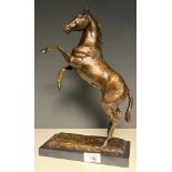 Bronze sculpture of a horse rearing. Fitted upon a black slate base. [37cm high]