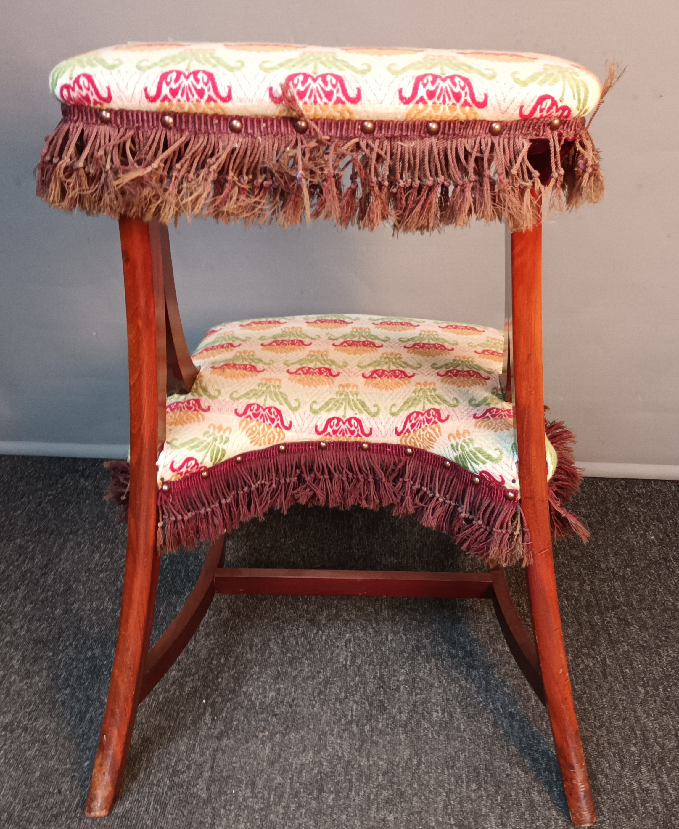 19th century prayer stool/ chair, upholstered in a floral material with brown fringe, raised on - Image 4 of 4