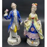 Two 19th century Chelsea pottery gentleman and lady figurine. [19cm high]
