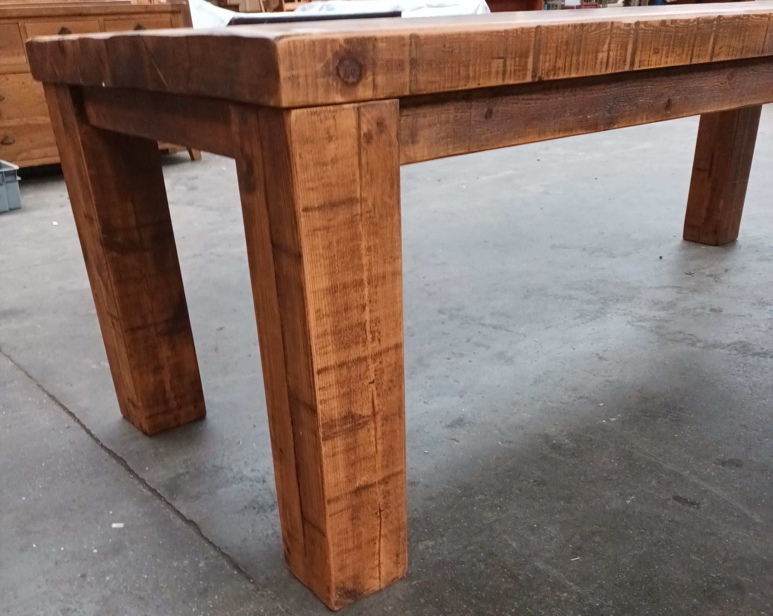 Solid rustic wood dining table, the long rectangular surface raised on square block legs [ - Image 3 of 5