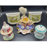 A selection of 19th century collectable porcelain to include two ornate lidded preserve pots, ornate