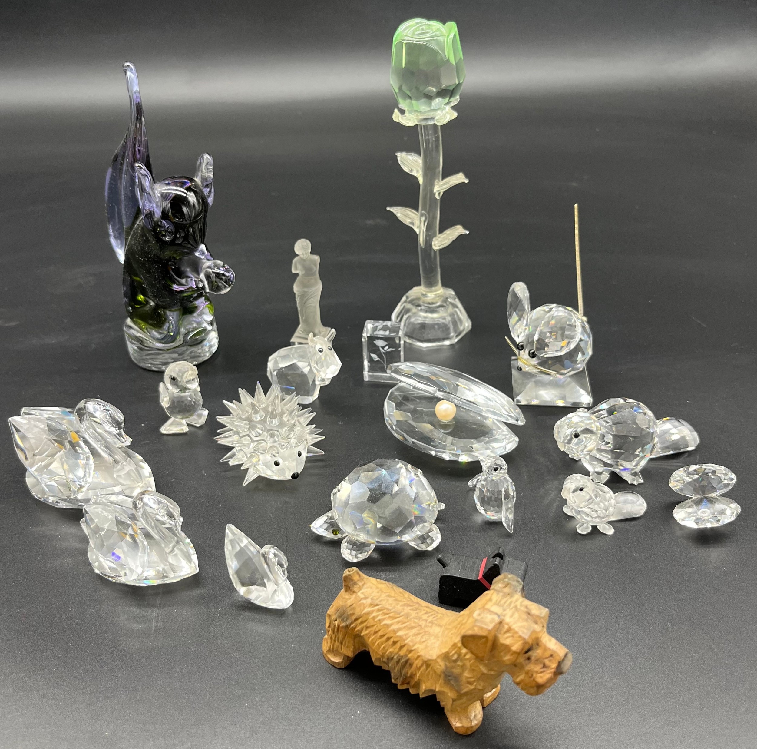 A Quantity of crystal and art glass animals to include various Swarovski crystal figures.