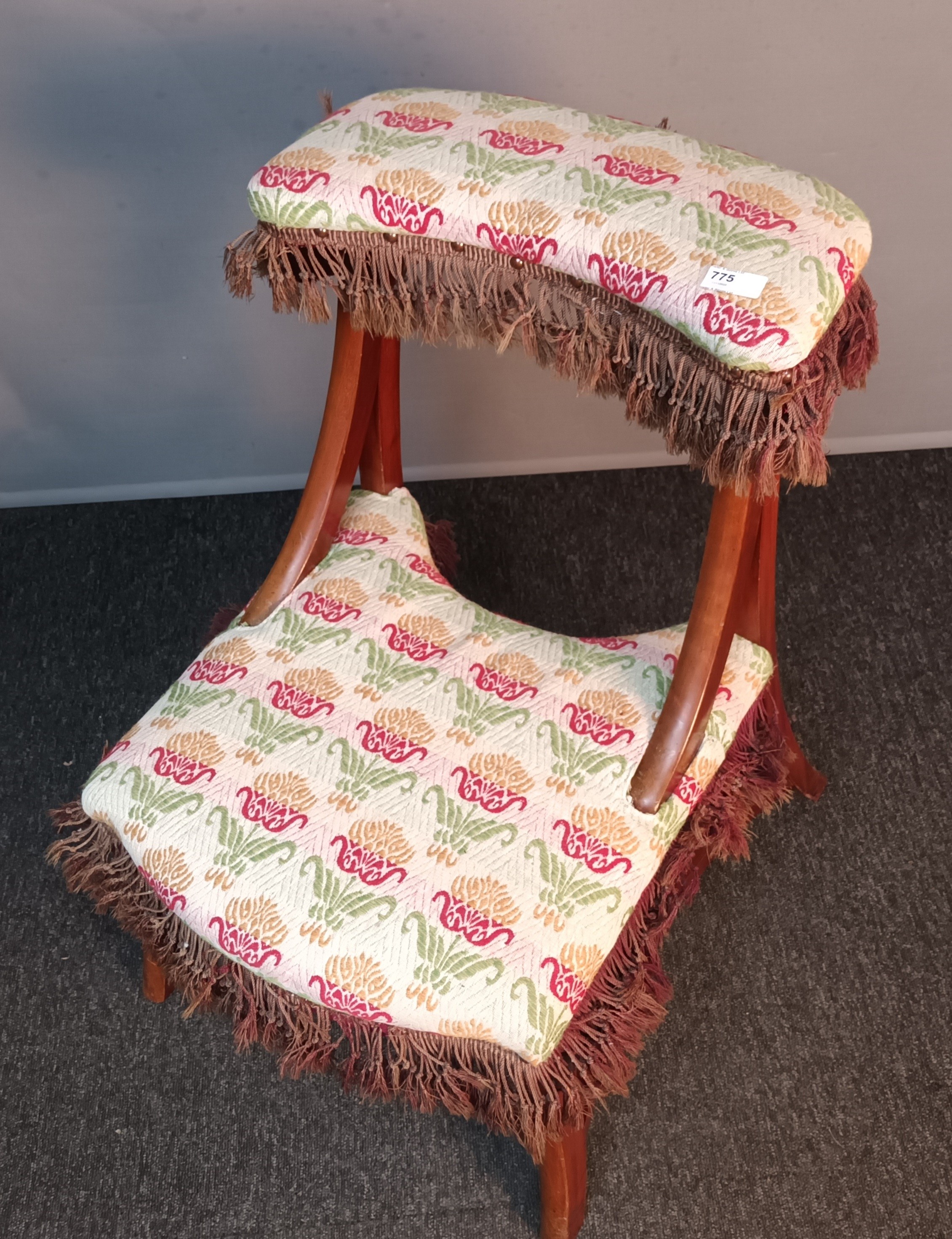 19th century prayer stool/ chair, upholstered in a floral material with brown fringe, raised on - Image 2 of 4